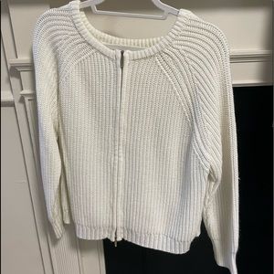 White sweater small with zipper in back.